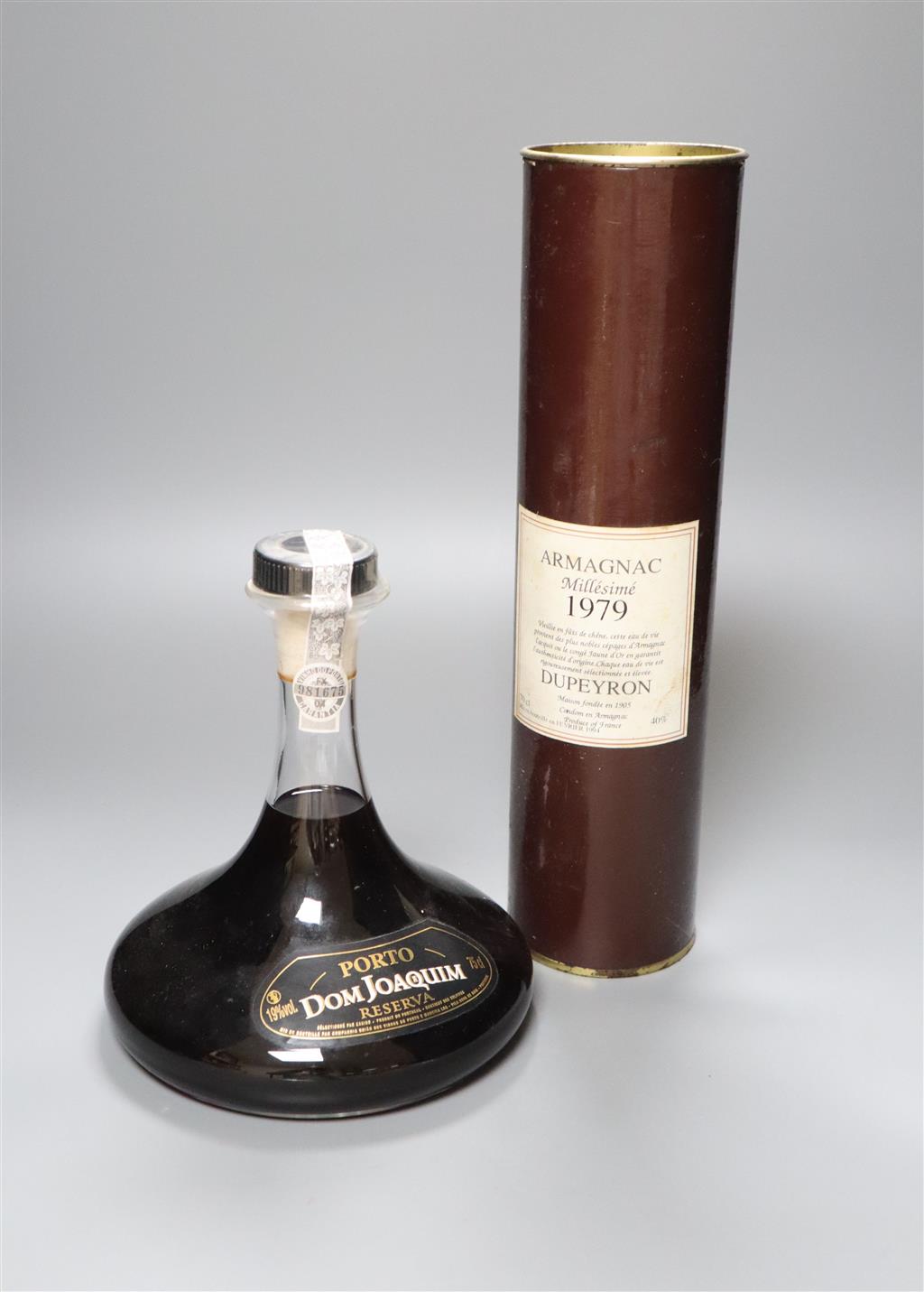 A bottle of 1976 Dupeyron Armagnac Millesime and a decanter bottle of Porto Dom Joaquim Reserva (2)